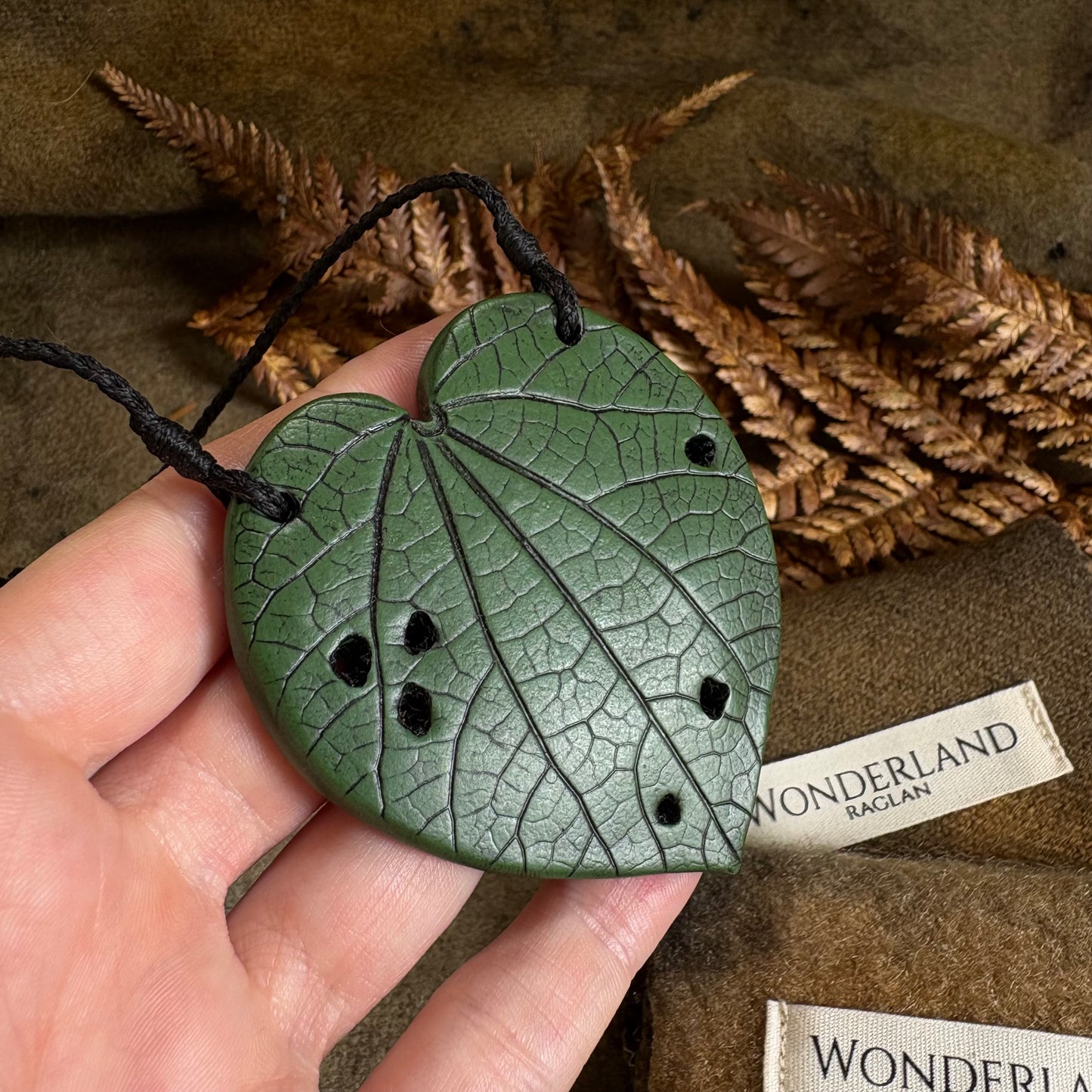 Kawakawa Necklace Large 6cm. On black cord