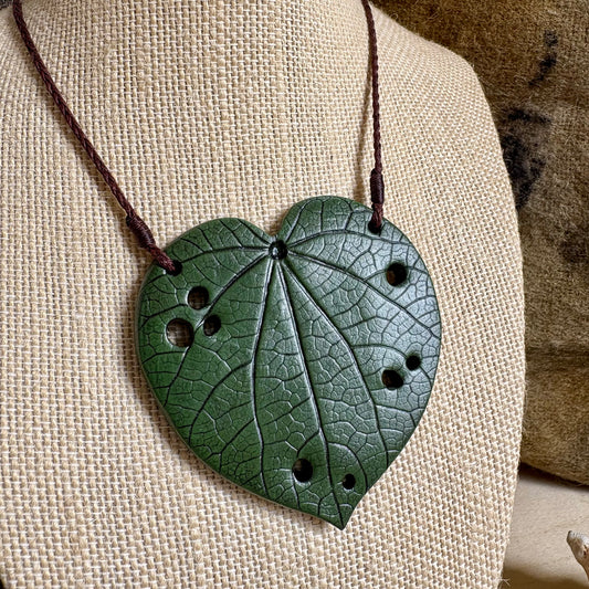 Kawakawa Necklace Large 7cm       On Brown cord