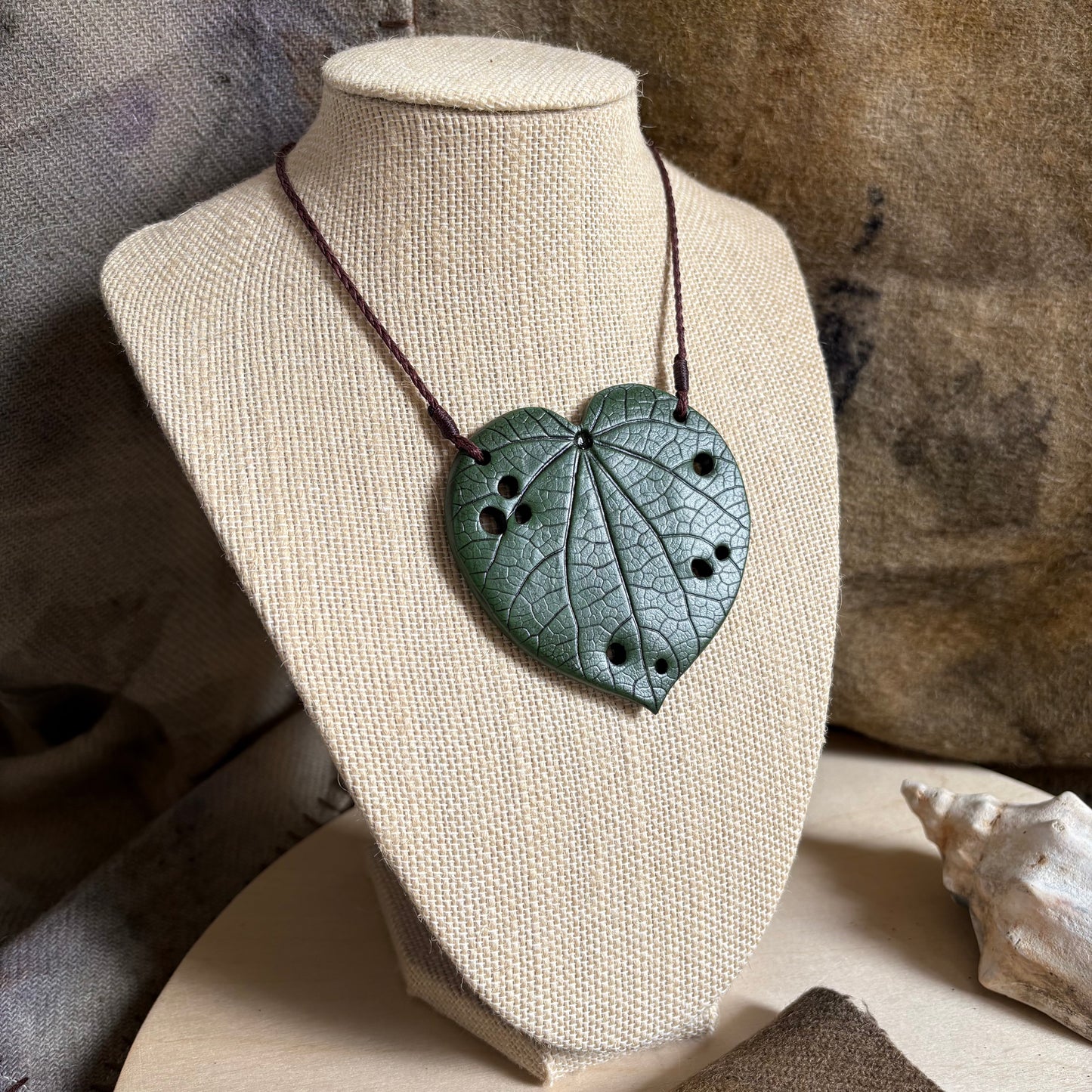 Kawakawa Necklace Large 7cm       On Brown cord