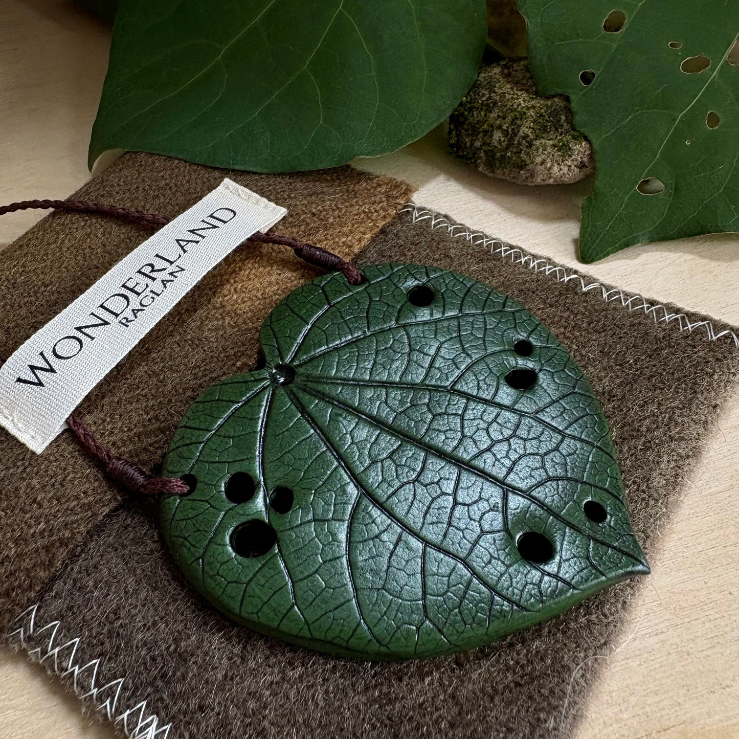 Kawakawa Necklace Large 7cm       On Brown cord