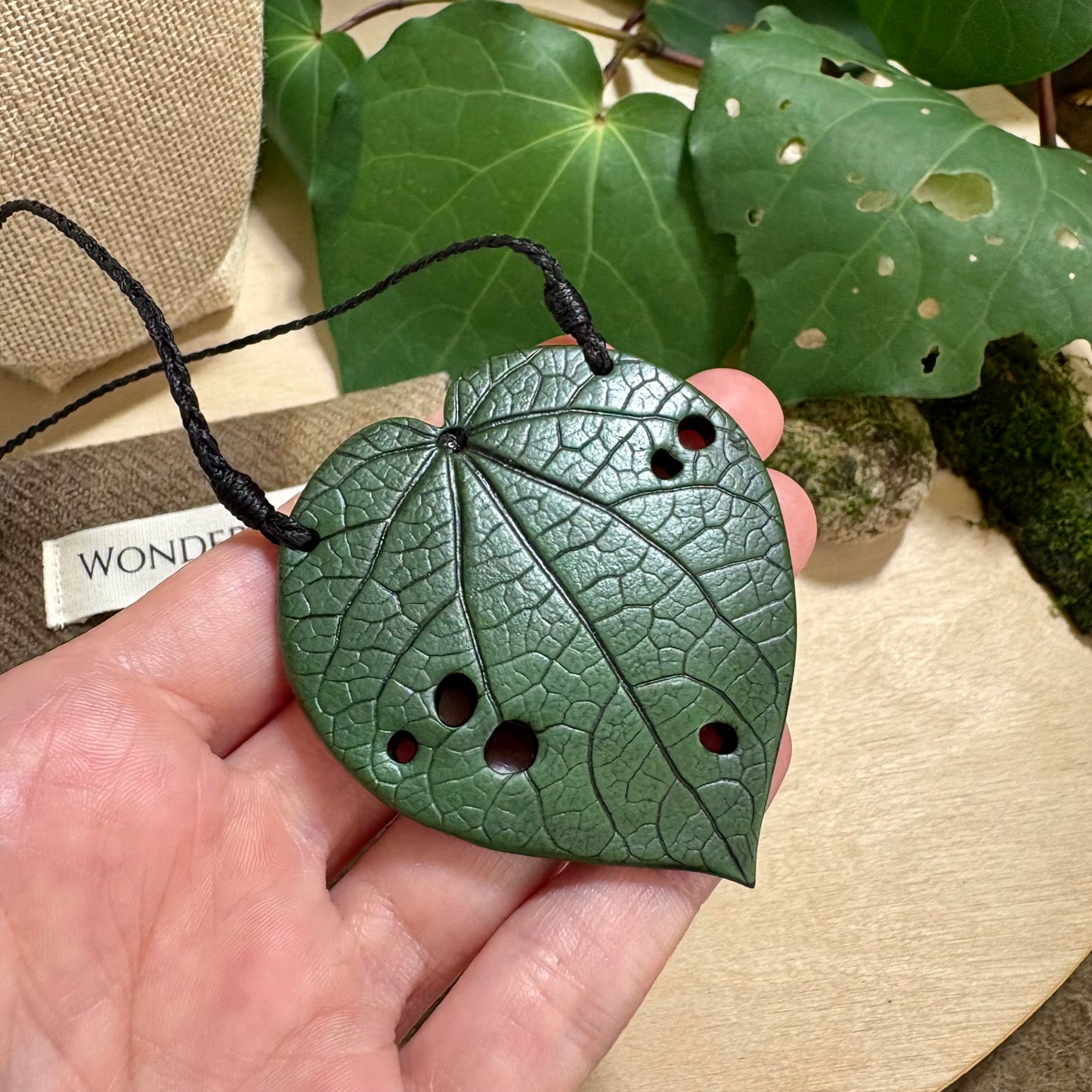 Kawakawa Necklace Large 6cm.  On black cord