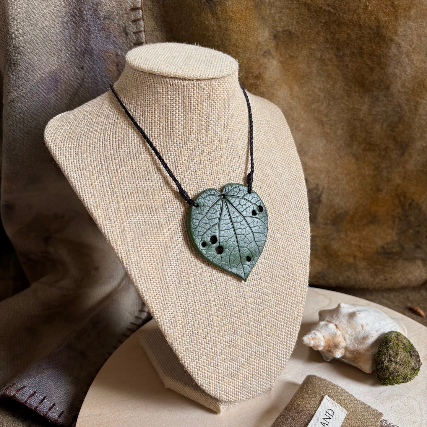 Kawakawa Necklace Large 6cm.  On black cord