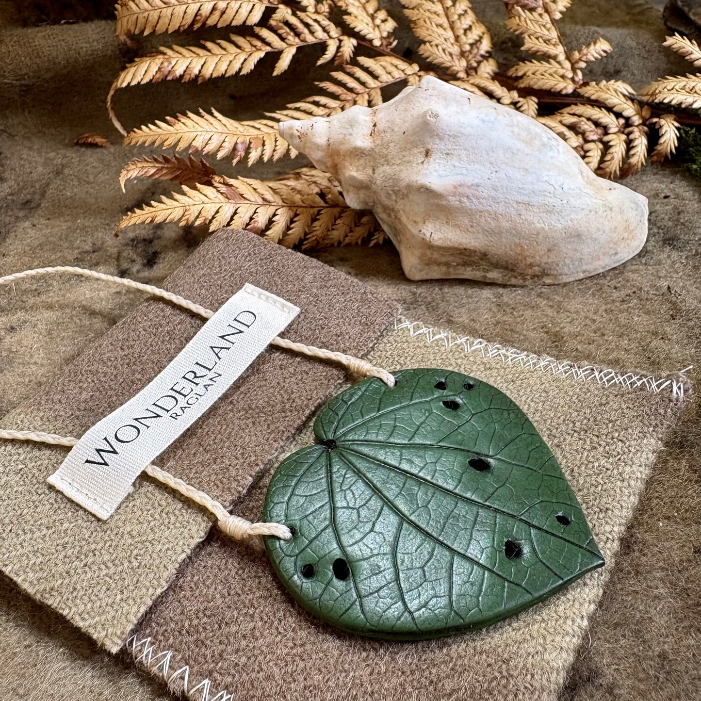 Kawakawa Necklace Large 6cm.  On cream cord
