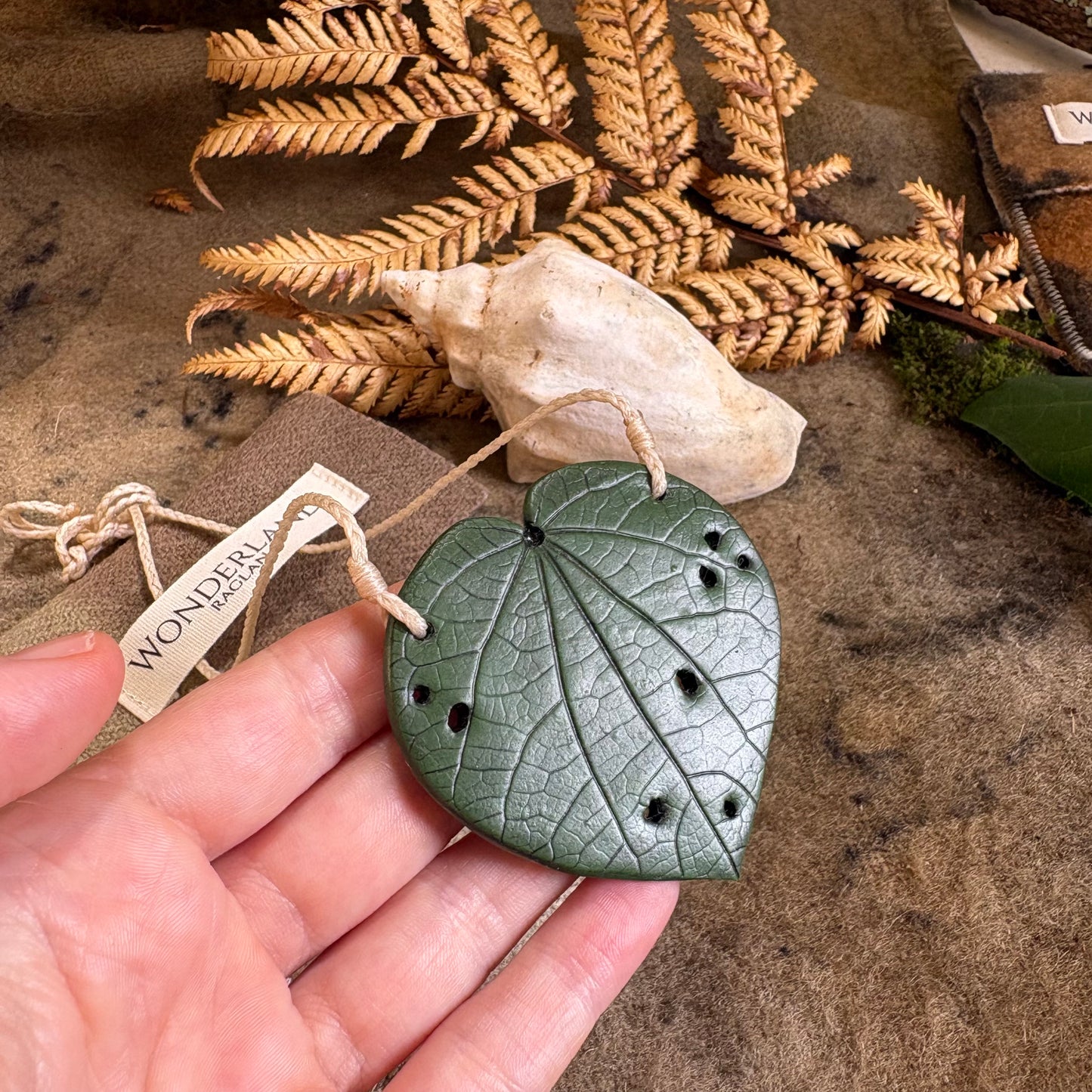 Kawakawa Necklace Large 6cm.  On cream cord